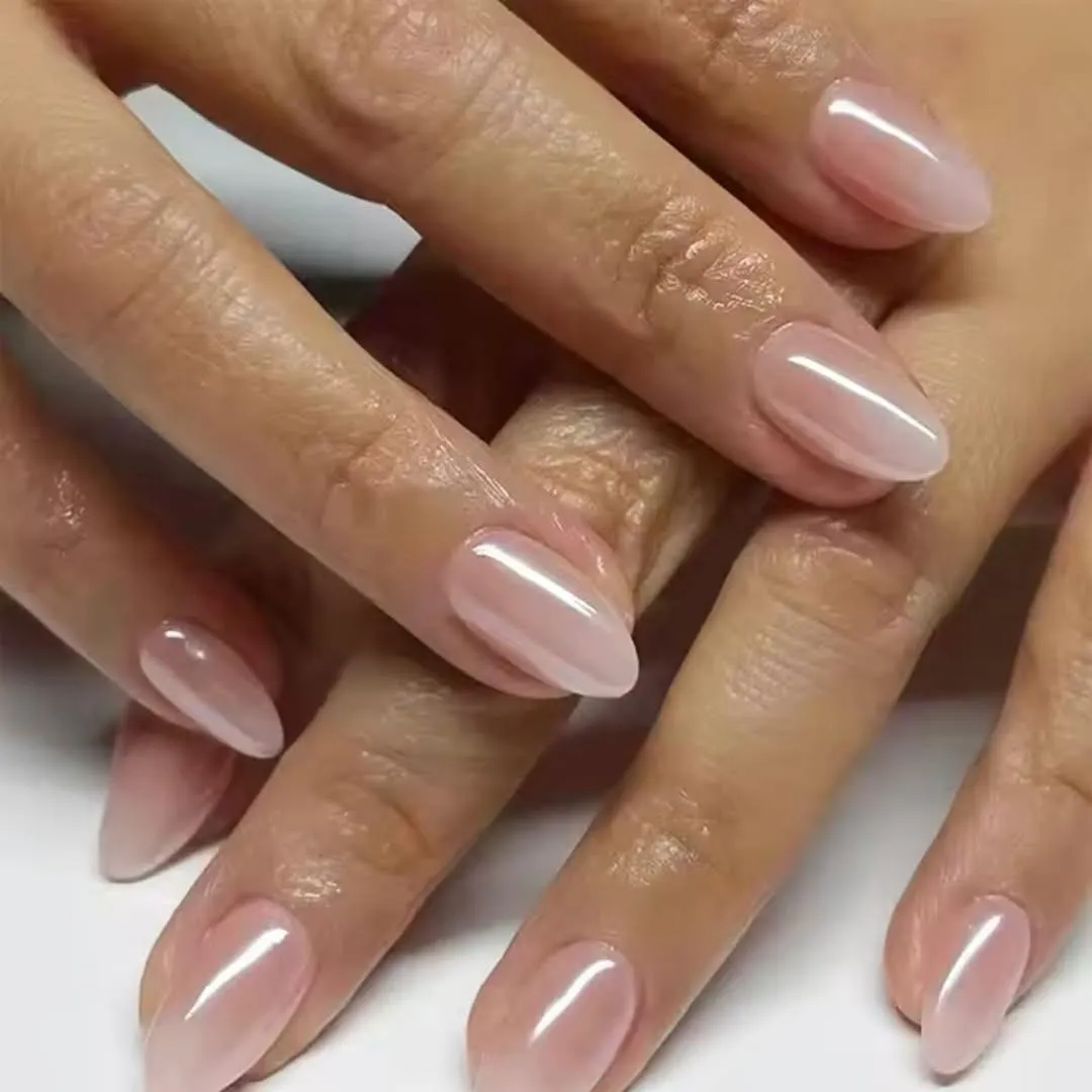 Almond nails in a nude chrome finish